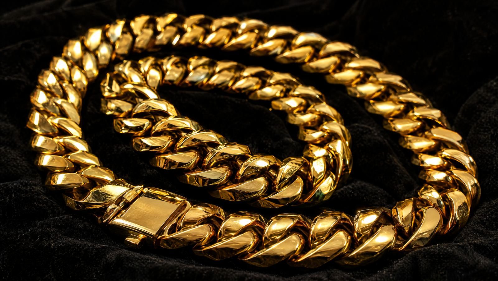 A 14K Miami Cuban chain on black velvet